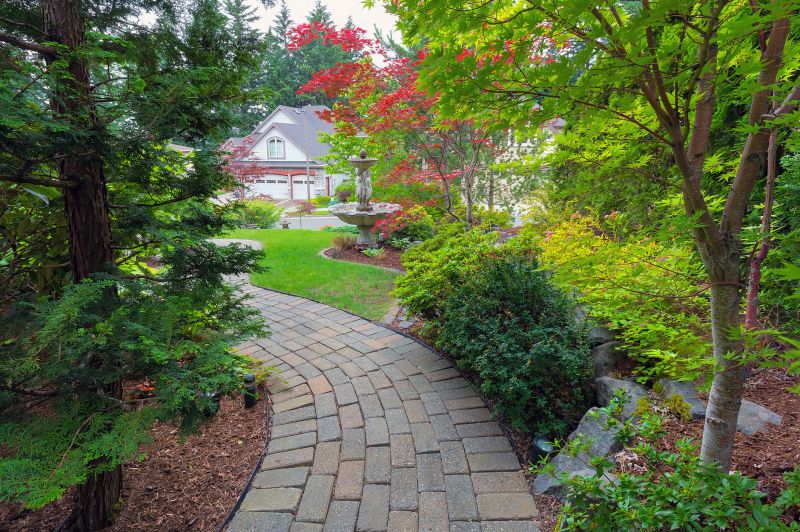 Paver surface with lush landscaping